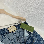 Jeans blu e monogramma 2023