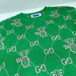 Maglione verde e logo monogramma