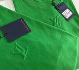 T-shirt con logo centrato verde e nero